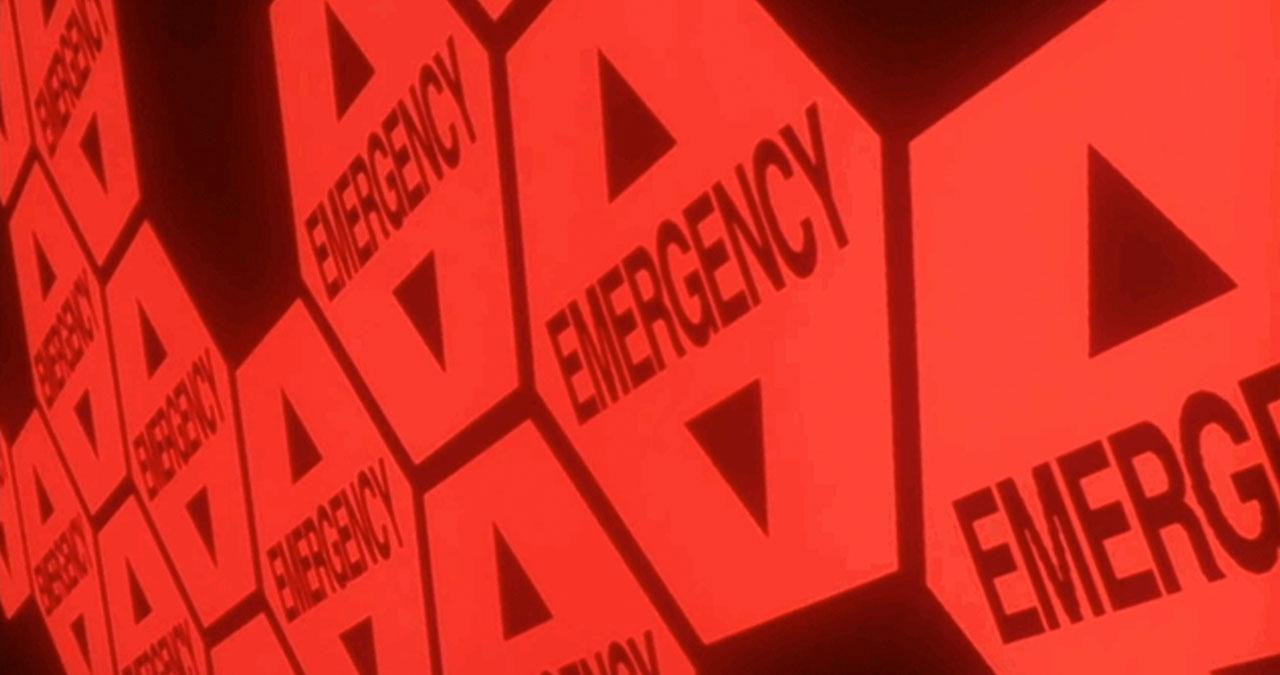computer screen with covered with "emergency" dialogs